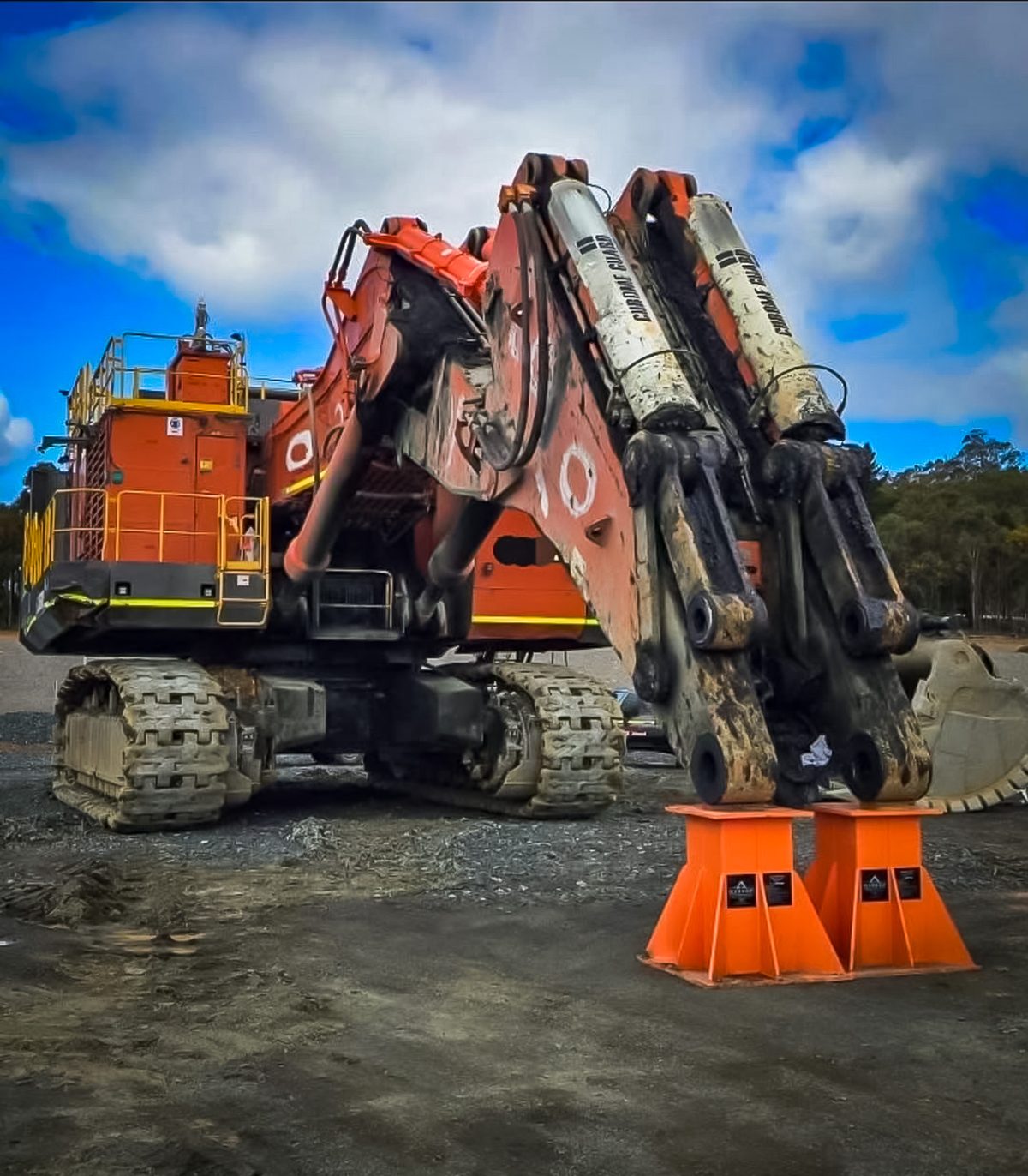 Large excavator supported on Clean Cut engineering stands