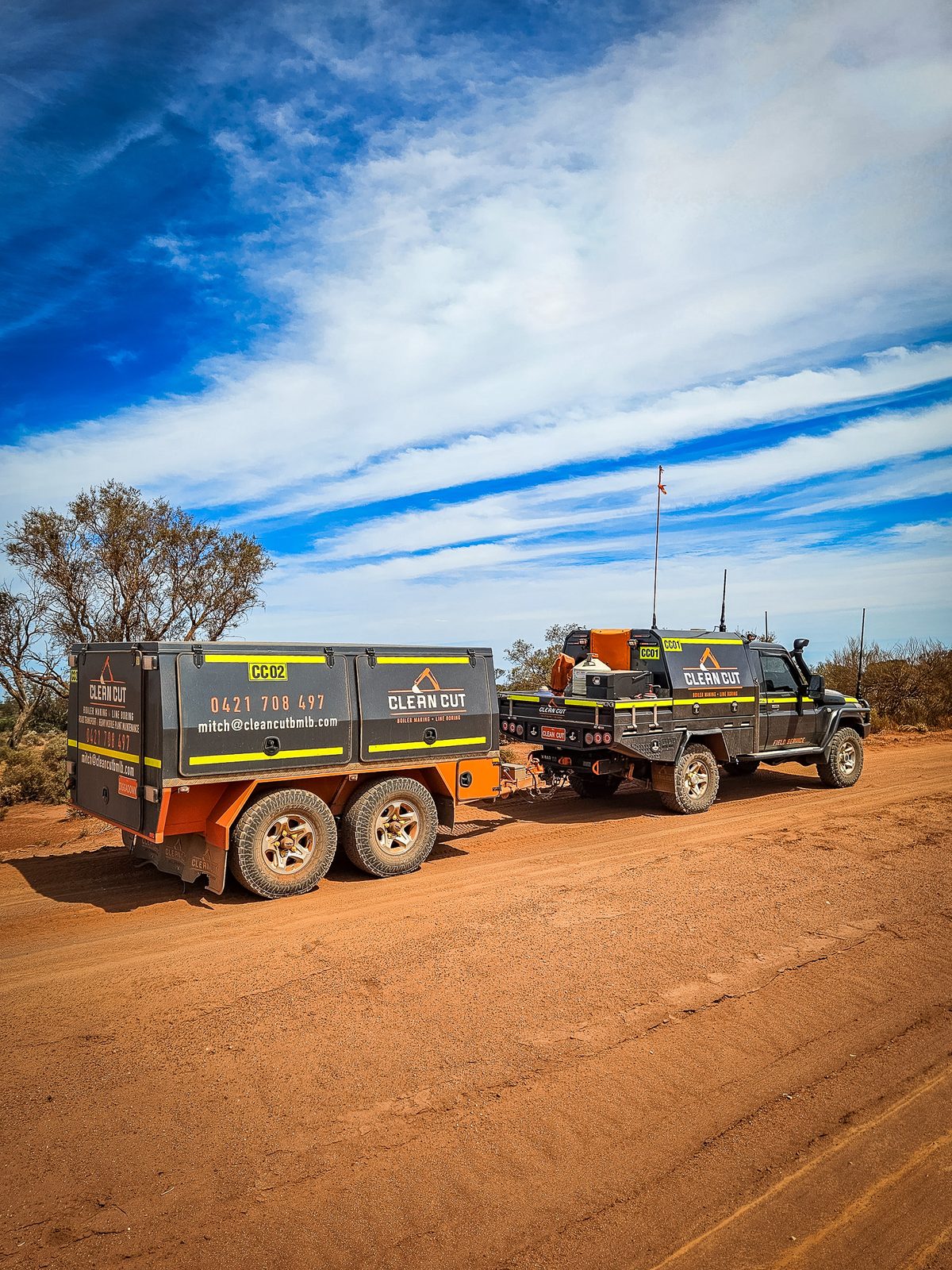 Clean Cut field service vehicle and trailer on a WA access road